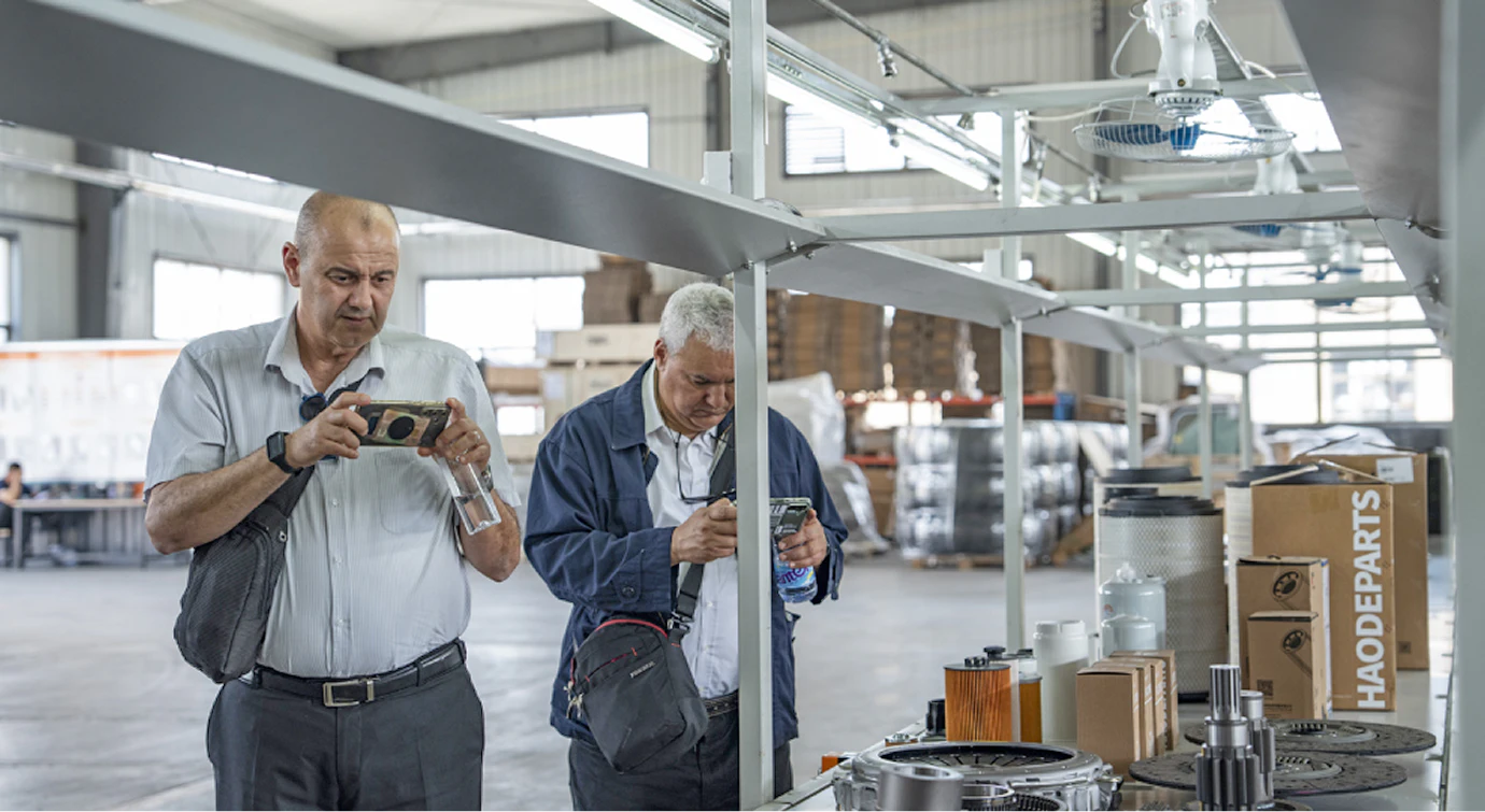 Clients inspecting products in our warehouse